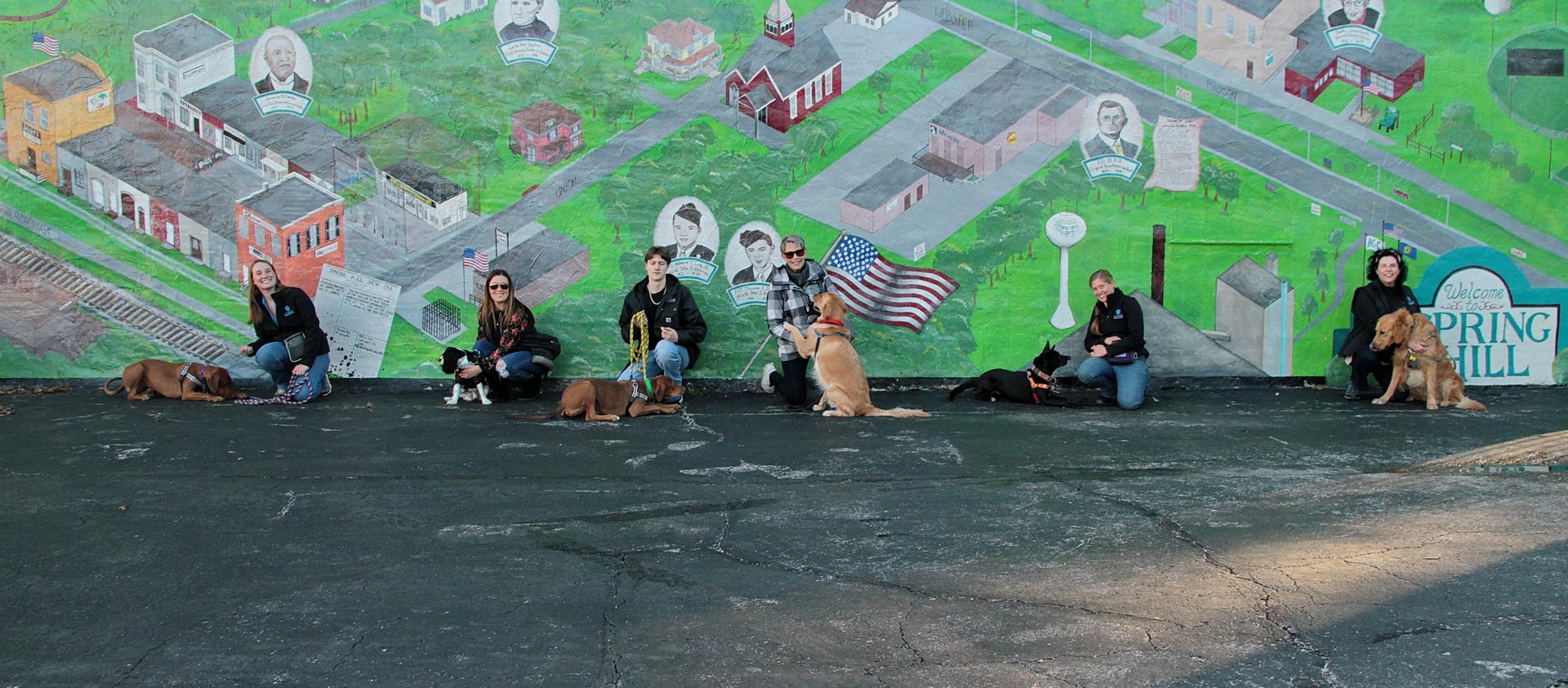 Canine Solution Team With Their Dogs Outside