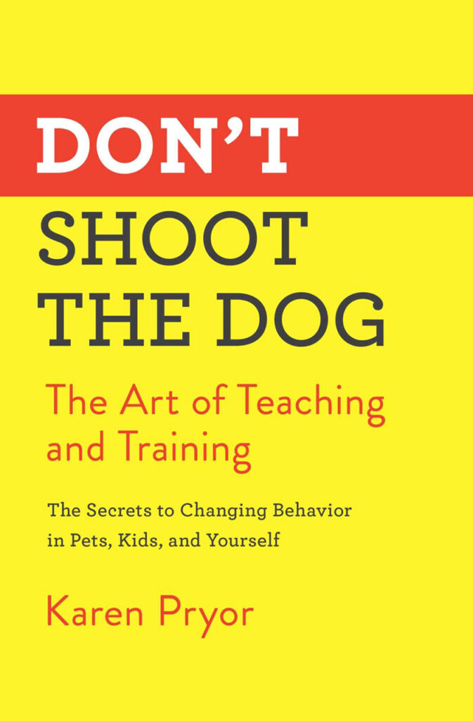 Dont Shoot The Dog Karen Pryor dog training manual with yellow cover
